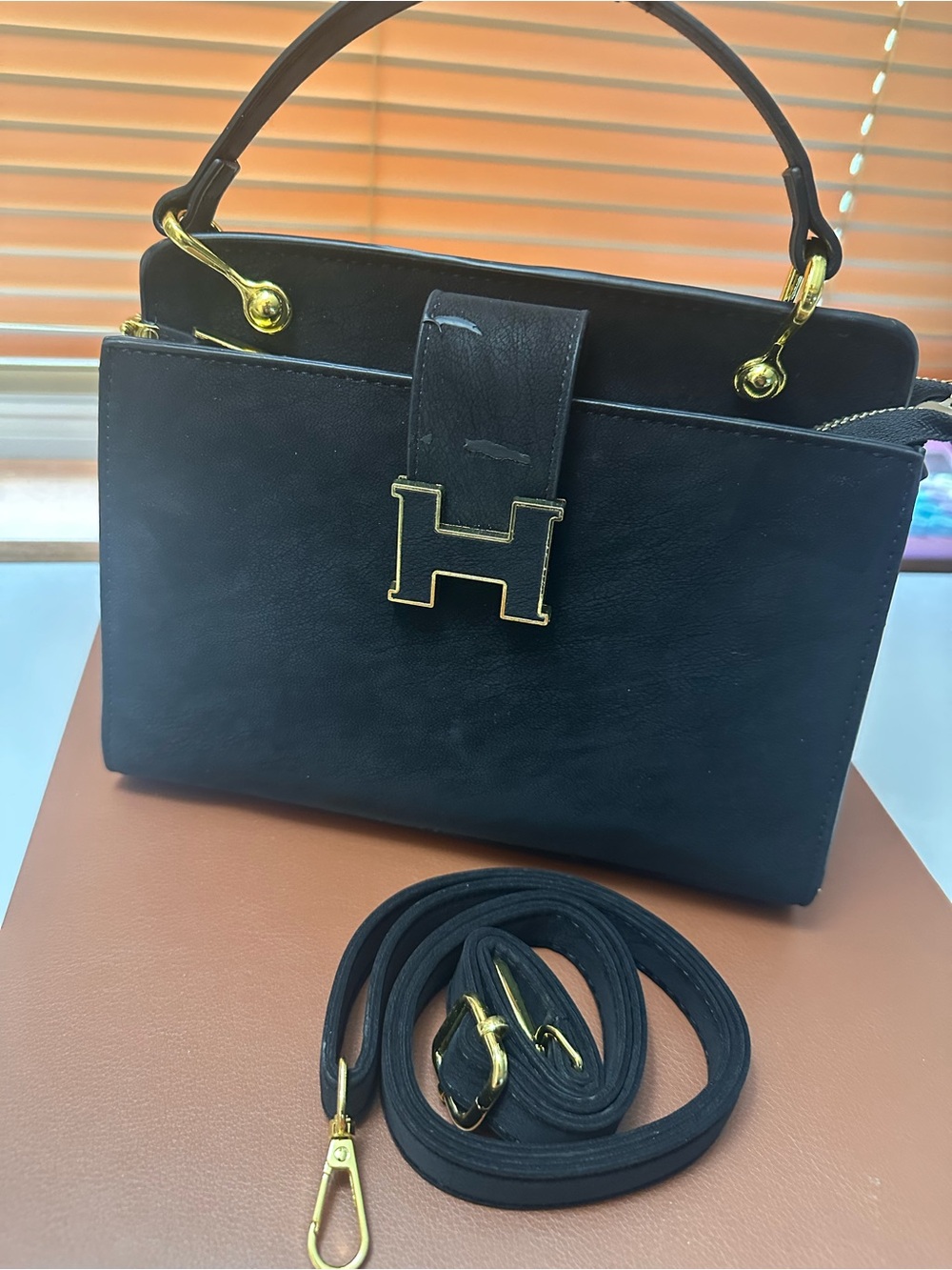 Black Leather Top-Handle Bag with Gold H Accent